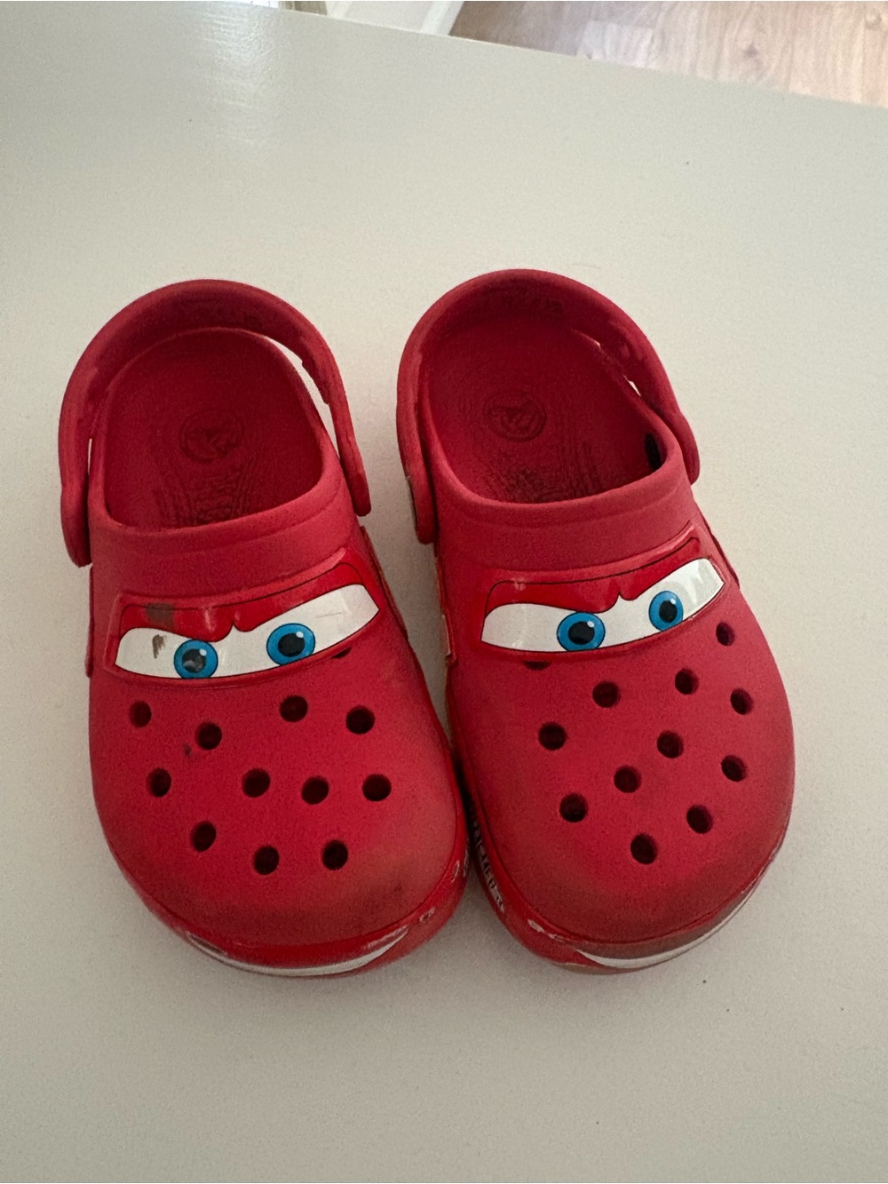 CROCS Kids' Red Character Clogs with Blue Eye Graphic